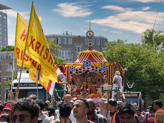 Devotees pulling Lord Jagannatha's chariot during Ratha Yatra Amsterdam