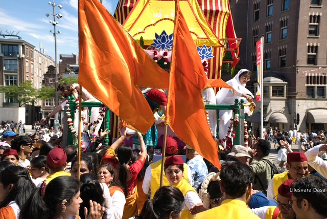 Devotees pulling Lord Jagannatha's chariot during Ratha Yatra Amsterdam